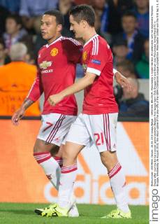 - BRUGGE, BELGIUM: Manchester s Ander Herrera (R) celebrates with his teammate Memphis Depay after scoring during a soccer game between Belgian first league team Club Brugge KV and British club Manchester United ManU FC in Brugge, Wednesday 26 August 2015, the return game of the play-offs of the UEFA Champions League competition. Manchester United won the first leg 3-1. KURTxDESPLENTER  x04687663x