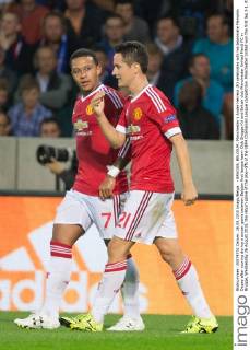 - BRUGGE, BELGIUM: Manchester s Ander Herrera (R) celebrates with his teammate Memphis Depay after scoring during a soccer game between Belgian first league team Club Brugge KV and British club Manchester United ManU FC in Brugge, Wednesday 26 August 2015, the return game of the play-offs of the UEFA Champions League competition. Manchester United won the first leg 3-1. KURTxDESPLENTER  x04687664x
