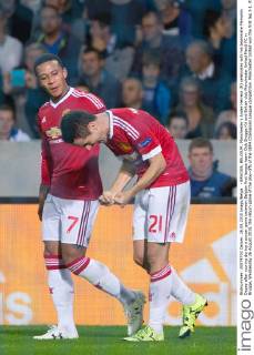 - BRUGGE, BELGIUM: Manchester s Ander Herrera (R) celebrates with his teammate Memphis Depay after scoring during a soccer game between Belgian first league team Club Brugge KV and British club Manchester United ManU FC in Brugge, Wednesday 26 August 2015, the return game of the play-offs of the UEFA Champions League competition. Manchester United won the first leg 3-1. KURTxDESPLENTER  x04687665x
