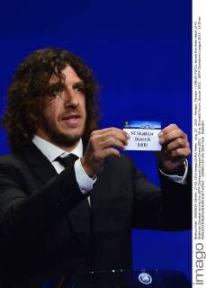 Aug. 27, 2015 - Monaco, Monaco - CARLES PUYOL shows the draw result of FC Shakhtar Donetsk during the UEFA Champions League Draws 2015 - 16 at Grimaldi Forum. Soccer 2015 - UEFA Champions League 2015 - 16 Draw  - ZUMAm119