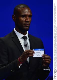 Aug. 27, 2015 - Monaco, Monaco - ERIC ABIDAL ex Barcelona soccer player shows the draw result of Maccabi Tel-Aviv during the UEFA Champions League Draws 2015 - 16 at Grimaldi Forum. Soccer 2015 - UEFA Champions League 2015 - 16 Draw - ZUMAm119