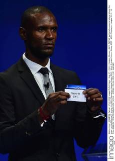 Aug. 27, 2015 - Monaco, Monaco - ERIC ABIDAL ex Barcelona soccer player shows the draw result of Malmo FF during the UEFA Champions League Draws 2015 - 16 at Grimaldi Forum. Soccer 2015 - UEFA Champions League 2015 - 16 Draw - ZUMAm119
