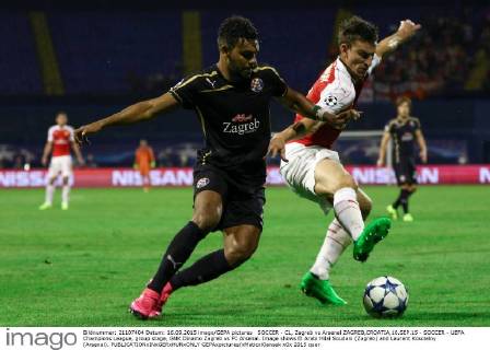 SOCCER - CL, Zagreb vs Arsenal ZAGREB,CROATIA,16.SEP.15 - SOCCER - UEFA Champions League, group stage, GNK Dinamo Zagreb vs FC Arsenal. Image shows El Arabi Hilal Soudani (Zagreb) and Laurent Koscielny (Arsenal). GEPAxpictures xMaticxKlansek