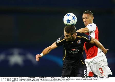 SOCCER - CL, Zagreb vs Arsenal ZAGREB,CROATIA,16.SEP.15 - SOCCER - UEFA Champions League, group stage, GNK Dinamo Zagreb vs FC Arsenal. Image shows Ivo Pinto (Zagreb) and Kieran Gibbs (Arsenal). GEPAxpictures xMaticxKlansek