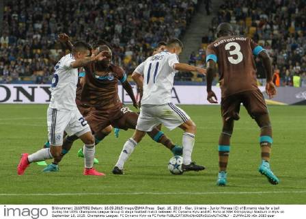 Sept. 16, 2015 - Kiev, Ukraine - Junior Moraes (C) of Dynamo vies for a ball during the UEFA Champions League Group G stage football match between FC Dynamo Kyiv and FC Porto at NSK Olimpiyskyi Stadium in Kyiv on September 16, 2015. Champions League: FC Dynamo Kyiv vs FC Porto - ZUMAn230