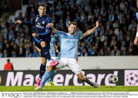 , 150930 Real Madrids Cristiano Ronaldo och Malmö FFs Kari Arnarson during UEFA Champions League 2015 2016 match between Malmö FF and Real Madrid.  Copyright: PETTERxARVIDSON BB150930PA134
