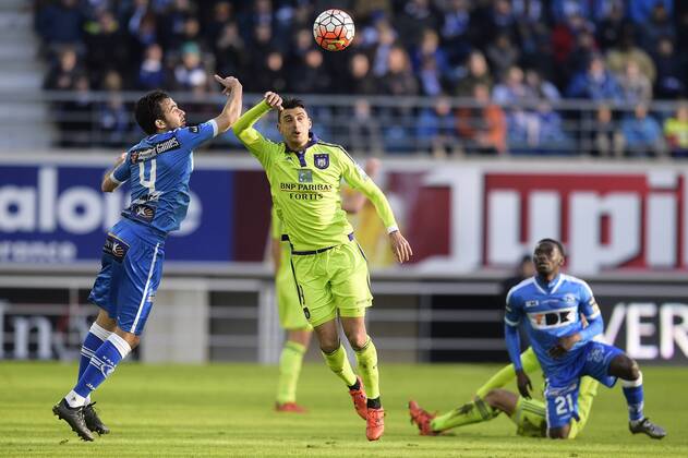 - GENT, BELGIUM: Gent s Rafinha Rafael Scapini de Almeida and Anderlecht s Matias Suarez fight for the ball during the Jupiler Pro League match between KAA Gent and RSC Anderlecht, in Gent, Sunday 17 January 2016, on day 22 of the Belgian soccer championship. YORICKxJANSENS  x04775348x