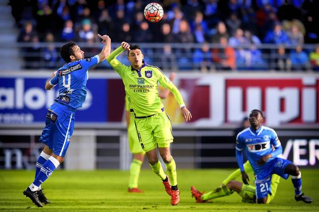 - GENT, BELGIUM: Gent s Rafinha Rafael Scapini de Almeida and Anderlecht s Matias Suarez fight for the ball during the Jupiler Pro League match between KAA Gent and RSC Anderlecht, in Gent, Sunday 17 January 2016, on day 22 of the Belgian soccer championship. YORICKxJANSENS  x04775850x