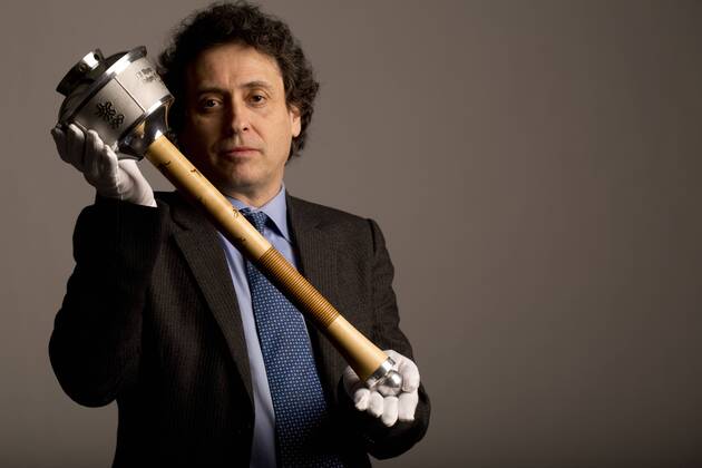Jan. 15, 2016 - Toronto, ON, Canada - TORONTO, ON- JANUARY 15:.Robert Livingston photographed with the 1988 Olympic torch that is up for auction.. Olymic memorabilia auction - ZUMAt14_