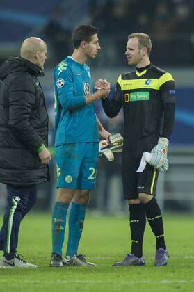 Wolfsburg s goalkeeper Koen Casteels and Gent s goalkeeper Matz Sels pictured after a game between Belgian KAA Gent and German VfL Wolfsburg, a first leg of the 1 8 finals of the UEFA Champions League competition, in Gent, Wednesday 17 February 2016. JASPERxJACOBS x04794979x