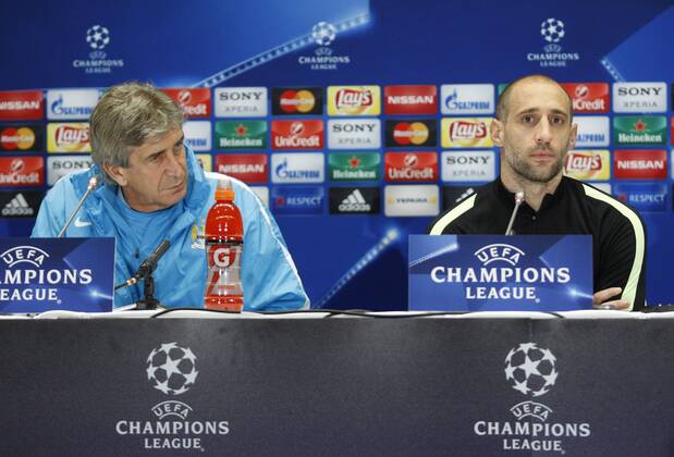 Feb. 23, 2016 - Kiev, Ukraine - Manchester City s manager Manuel Pellegrini (L) and player Pablo Zabaleta (R) speaks during their a press conference PK Pressekonferenz at Olimpiyskiy stadium,in Kiev,Ukraine,23 February,2016. Manchester City will face Dynamo Kyiv in the UEFA Champions League round of 16 football match,on 24 February,2016. FC Manchester City Press Conference and Training Session  - ZUMAn230