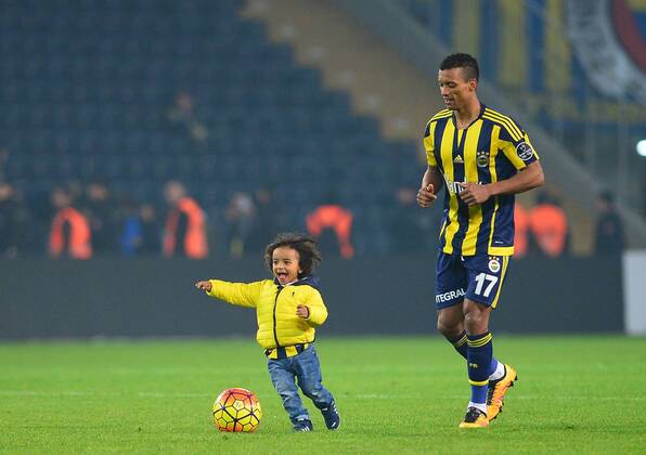 Turkey Spor Toto Superlig soccer match between Fenerbahce and Besiktas at Fenerbahce Ulker Stadium in Istanbul on February 29 , 2016. Final Score : Fenerbahce 2 - Besiktas 0 Pictured: Fenerbahce player Luis Nani and his Son . 