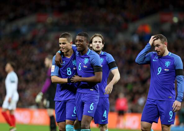LONDON, March 29, 2016 -- Players of the Netherlands celebrate after scoring during the International Friendly Länderspiel Nationalteam Match between England and the Netherlands at Wembley Stadium in London, Britain, on March 29, 2016. England lost 1-2. ) (SP)BRITAIN-LONDON-SOCCER-FRIENDLY MATCH-ENGLAND VS NETHERLANDS HanxYan 