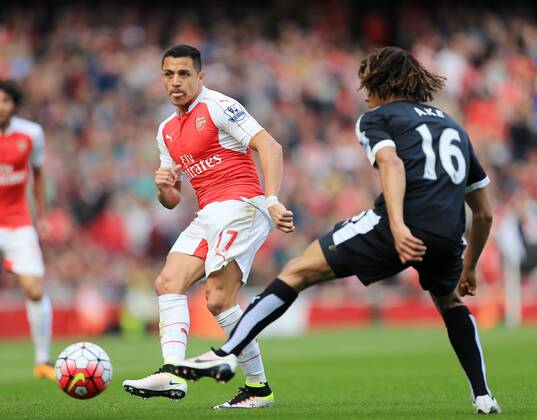Arsenal s Alexis Sanchez tussles with Watford s Nathan Ake during the Premier League match at Emirates Stadium. Photo credit should read: David Klein Sportimage EDITORIAL USE ONLY. No use with unauthorised audio, video, data, fixture lists, club league logos or live services. Online in-match use limited to 120 images, no video emulation. No use in betting, games or single club league player publications.