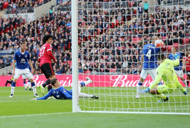 Manchester United ManU s Marouane Fellaini scoring his sides opening goal during the Emirates FA Cup, Semi-Final match at Wembley Stadium, London. Photo credit should read: David Klein Sportimage EDITORIAL USE ONLY. No use with unauthorised audio, video, data, fixture lists, club league logos or live services. Online in-match use limited to 120 images, no video emulation. No use in betting, games or single club league player publications.