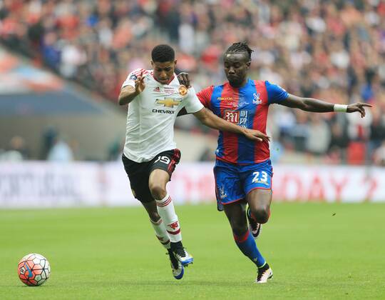 Crystal Palace s Pape Souare tussles with Manchester United ManU s Marcus Rashford during the Emirates FA Cup Final match at Wembley Stadium. Photo credit should read: David Klein Sportimage EDITORIAL USE ONLY. No use with unauthorised audio, video, data, fixture lists, club league logos or live services. Online in-match use limited to 120 images, no video emulation. No use in betting, games or single club league player publications.