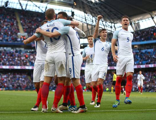Jamie Vardy of England celebrates scoring his sides second goal during the International Friendly Länderspiel match at the Etihad Stadium. Photo credit should read: Philip Oldham Sportimage EDITORIAL USE ONLY. No use with unauthorised audio, video, data, fixture lists, club league logos or live services. Online in-match use limited to 120 images, no video emulation. No use in betting, games or single club league player publications.