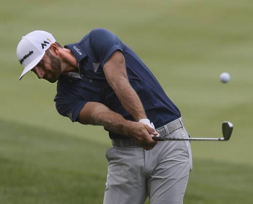 July 3, 2016 - Akron, OH, USA - Dustin Johnson hits from the rough on the 17th hole on the final day of the Bridgestone Invitational golf tournament on Sunday, July 3, 2016, at Firestone Country Club in Akron, Ohio. Johnson won the tournament by one stroke. Bridgestone Invitational - ZUMAm67_