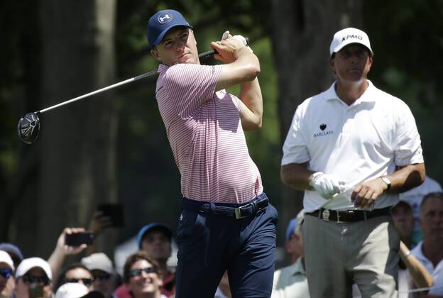 Phil Mickelson watches Jordan Spieth tee off in a practice round at the PGA Golf Herren Championship at Baltusrol Golf Club in Springfield, New Jersey on July 26, 2016.  PGA20160726115 JOHNxANGELILLO