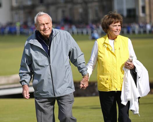 Arnold Palmer (L) seen with his wife Kathleen Gawthrop in this July 15, 2015 file photo from the the144th Open Championship at St.Andrews, died today, September 25, 2016, at 87 according to a USGA statement. The seven-time major winner was known as the king of golf and given credit for bringing the to the masses. File  WAX20160925302 KEVINxDIETSCH
