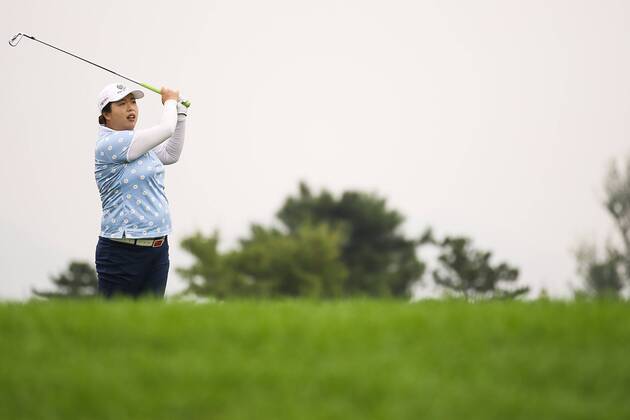 BEIJING, CHINA - SEPTEMBER 26: Feng Shanshan of China swings the club during a training session on Day one of 2016 Reignwood LPGA Golf Damen Classic at Reignwood Pine Valley on September 26, 2016 in Beijing, China.  CFP492737096