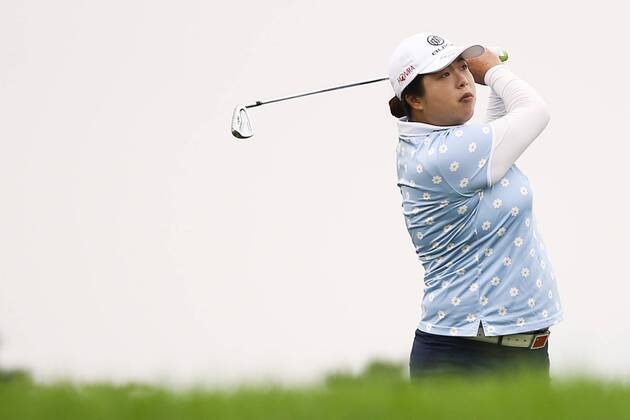 BEIJING, CHINA - SEPTEMBER 26: Feng Shanshan of China swings the club during a training session on Day one of 2016 Reignwood LPGA Golf Damen Classic at Reignwood Pine Valley on September 26, 2016 in Beijing, China.  CFP492737098