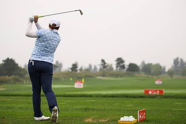 BEIJING, CHINA - SEPTEMBER 26: Feng Shanshan of China swings the club during a training session on Day one of 2016 Reignwood LPGA Golf Damen Classic at Reignwood Pine Valley on September 26, 2016 in Beijing, China.  CFP492737102