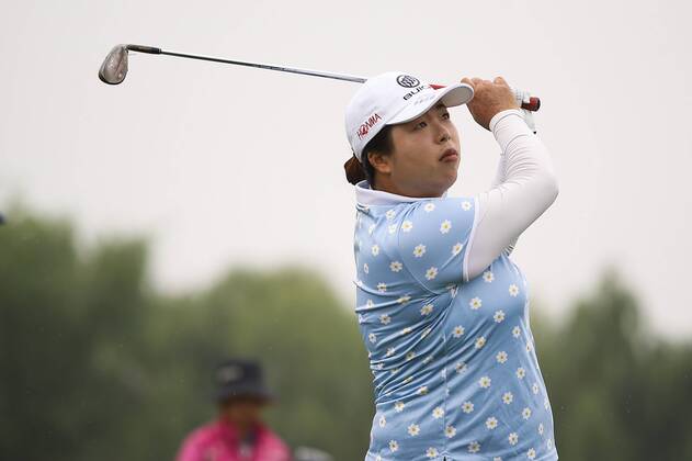 BEIJING, CHINA - SEPTEMBER 26: Feng Shanshan of China swings the club during a training session on Day one of 2016 Reignwood LPGA Golf Damen Classic at Reignwood Pine Valley on September 26, 2016 in Beijing, China.  CFP492737104