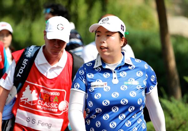 BEIJING, CHINA - SEPTEMBER 29: Feng Shanshan of China in action during the 1st round of the 2016 Reignwood LPGA Golf Damen Classic at Reignwood golf club on September 29, 2016 in Beijing, China.  CFP492963931