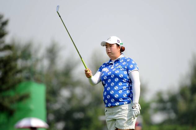 BEIJING, CHINA - SEPTEMBER 29: Feng Shanshan of China in action during the 1st round of the 2016 Reignwood LPGA Golf Damen Classic at Reignwood golf club on September 29, 2016 in Beijing, China.  CFP492963951