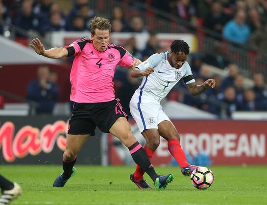 Christophe Berra of Scotland tackles Raheem Sterling of England during the FIFA World Cup WM Weltmeisterschaft Fussball Qualifying Group F match at Wembley Stadium, London. Picture date: November 11th, 2016. Pic David Klein Sportimage EDITORIAL USE ONLY. No use with unauthorised audio, video, data, fixture lists, club league logos or live services. Online in-match use limited to 120 images, no video emulation. No use in betting, games or single club league player publications.