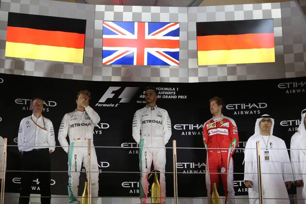 Abu Dhabi Grand Prix, UAE 24 - 27 November 2016 27.11.2016 - Race, 2nd place Nico Rosberg (GER) Mercedes AMG F1 W07 Hybrid and Champion 2016, Lewis Hamilton (GBR) Mercedes AMG F1 W07 Hybrid race winner and 3rd place Sebastian Vettel (GER) Scuderia Ferrari SF16-H 
