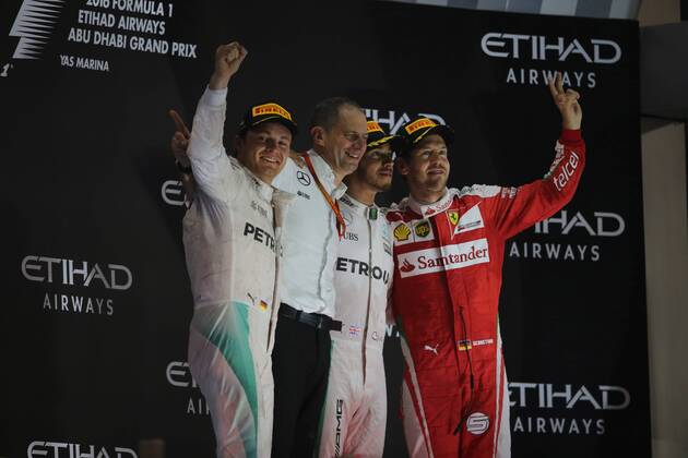 Abu Dhabi Grand Prix, UAE 24 - 27 November 2016 27.11.2016 - Race, 2nd place Nico Rosberg (GER) Mercedes AMG F1 W07 Hybrid and Champion 2016, Lewis Hamilton (GBR) Mercedes AMG F1 W07 Hybrid race winner and 3rd place Sebastian Vettel (GER) Scuderia Ferrari SF16-H 
