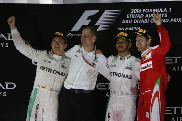 Abu Dhabi Grand Prix, UAE 24 - 27 November 2016 27.11.2016 - Race, 2nd place Nico Rosberg (GER) Mercedes AMG F1 W07 Hybrid and Champion 2016, Lewis Hamilton (GBR) Mercedes AMG F1 W07 Hybrid race winner and 3rd place Sebastian Vettel (GER) Scuderia Ferrari SF16-H 