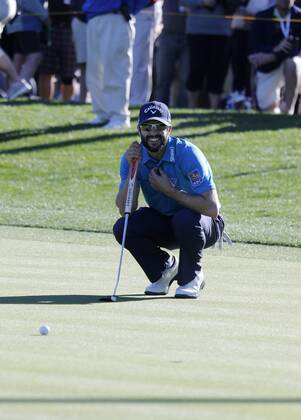 January 21, 2017 Adam Hadwin of Canada lines up a putt on the 17th hole during the third round of the CareerBuilder Challenge at La Quinta Country Club in La Quinta, California. CSM GOLF 2017: CareerBuilder Challenge JAN 21 - ZUMAc04_ 20170121_zaf_c04_338