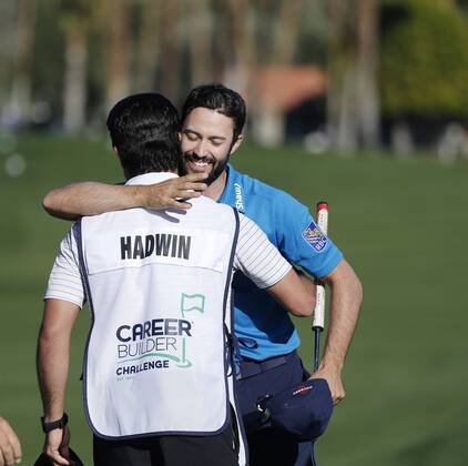 January 21, 2017 Adam Hadwin of Canada hugs his caddie Joe Cruz after shooting a 59 during the third round of the CareerBuilder Challenge at La Quinta Country Club in La Quinta, California. CSM GOLF 2017: CareerBuilder Challenge JAN 21 - ZUMAc04_ 20170121_zaf_c04_349