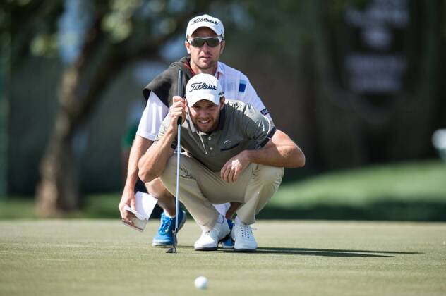 Maximillian Kieffer of Germany lines up a putt with his caddy during the PGA Golf Herren European Tour Dubai Desert Classic Tournament Day 3 at the Emirates Golf Club, Dubai, UAE on 4 February 2017. Copyright: xGrantxWinterx 14030084