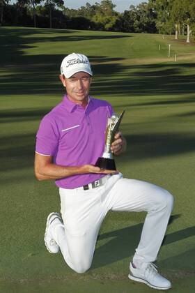 February 19th 2017, Lake Karrinyup Country Club, Perth, Western Australia, Australia; ISPS Handa World Super 6 Perth Golf Tournament Day 4; Brett Rumford (AUS) holds the winners trophy after beating Phachara Khongwatmai (THA) xDavidxWoodleyx  ActionPlus11848429