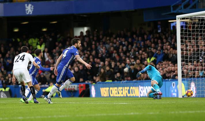 Chelsea s Cesc Fabregas scoring his sides opening goal during the Premier League match at the Stamford Bridge Stadium, London. Picture date February 25th, 2017 Pic David Klein Sportimage EDITORIAL USE ONLY. No use with unauthorised audio, video, data, fixture lists, club league logos or live services. Online in-match use limited to 120 images, no video emulation. No use in betting, games or single club league player publications.