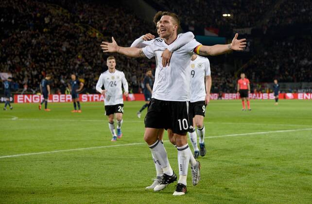 22.03.2017, xfux, Fussball Freundschaftsspiel, Deutschland - England, emspor, v.l. Lukas Podolski (Deutsche Fussball Nationalmannschaft DFB) Torjubel, Goal celebration, celebrate the goal zum 1:0 Dortmund