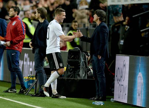 22.03.2017, xfux, Fussball Freundschaftsspiel, Deutschland - England, emspor, v.l. Lukas Podolski (Deutsche Fussball Nationalmannschaft DFB), Trainer Joachim JOGI Loew (Deutsche Fussball Nationalmannschaft DFB) jubelnd bejubelt jubelt jubeln Dortmund