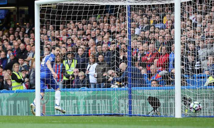Chelsea s Cesc Fabregas scoring his sides opening goal during the Premier League match at the Stamford Bridge Stadium, London. Picture date: April 1st, 2017. Pic credit should read: David Klein Sportimage via PA Images EDITORIAL USE ONLY. No use with unauthorised audio, video, data, fixture lists, club league logos or live services. Online in-match use limited to 120 images, no video emulation. No use in betting, games or single club league player publications.