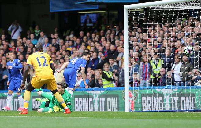 Chelsea s Cesc Fabregas scoring his sides opening goal during the Premier League match at the Stamford Bridge Stadium, London. Picture date: April 1st, 2017. Pic credit should read: David Klein Sportimage via PA Images EDITORIAL USE ONLY. No use with unauthorised audio, video, data, fixture lists, club league logos or live services. Online in-match use limited to 120 images, no video emulation. No use in betting, games or single club league player publications.