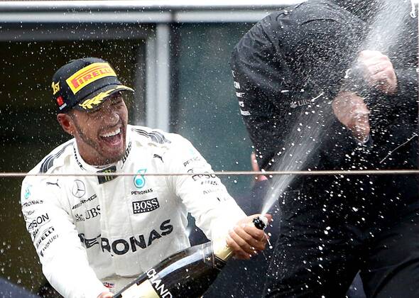 (170409) -- SHANGHAI, April 9, 2017 -- Mercedes driver Lewis Hamilton of Britain celebrates with champagne on the podium after winning the Formula One Chinese Grand Prix at the Shanghai International Circuit in Shanghai, east China, April 9, 2017. ) (SP)CHINA-SHANGHAI-F1-2017 CHINESE GRAND PRIX(CN) fanxjun 