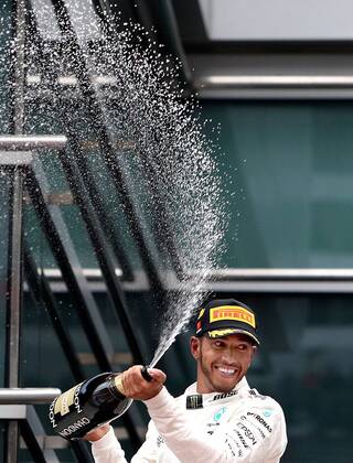 (170409) -- SHANGHAI, April 9, 2017 -- Mercedes driver Lewis Hamilton of Britain celebrates with champagne on the podium after winning the Formula One Chinese Grand Prix at the Shanghai International Circuit in Shanghai, east China, April 9, 2017. ) (SP)CHINA-SHANGHAI-F1-2017 CHINESE GRAND PRIX(CN) fanxjun 