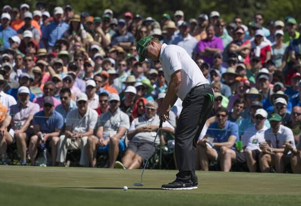 Charlie Hoffman putts for birdie on the second green during the fourth round of the 2017 Masters Tournament at Augusta National Golf Club in Augusta, Georgia on April 9, 2017.  AUG20170409320 KEVINxDIETSCH