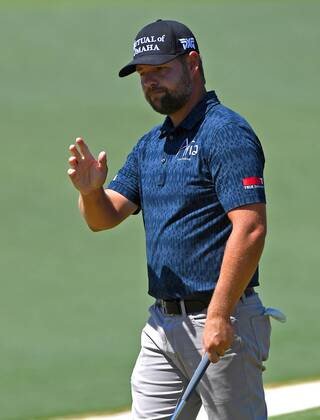 April 9, 2017 - Augusta, GA, USA - Ryan Moore acknowledges the applause of the gallery after sinking a putt on the second green during the final round of the Masters Tournament on Sunday, April 9, 2017 at Augusta National Golf Club in Augusta, Ga. 2017 Masters Round 4 - ZUMAm67_ 20170409_zaf_m67_046 Copyright: xJeffxSinerx