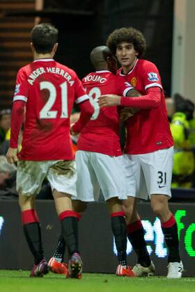 Manchester United ManU s Marouane Fellaini is congratulated by teammate Ashley Young during the The FA Cup match between Preston North End and Manchester United at Deepdale, Preston, England on 16 February 2015. Copyright: xJamesxWilliamsonx 02360028