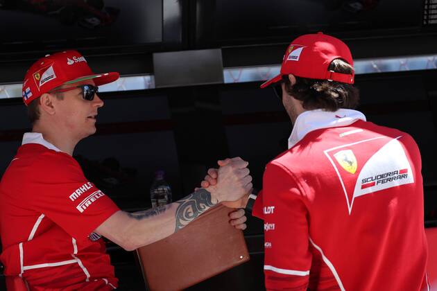 Russian Grand Prix, Sochi 27 - 30 April 2017 27.04.2017 - Kimi Raikkonen (FIN) Scuderia Ferrari SF70H and Antonio Giovinazzi (ITA) Test Driver, Scuderia Ferrari