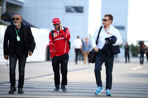 Russian Grand Prix, Sochi 27 - 30 April 2017 28.04.2017 - Kimi Raikkonen (FIN) Scuderia Ferrari SF70H and Mika Salo (FIN), FIA Steward